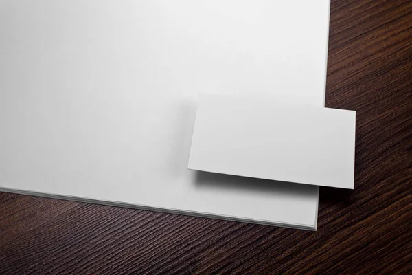 Mockup of white business card and letterhead at wooden backgroun — Stock Photo, Image