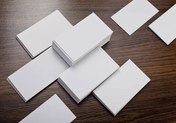Mockup of white business cards at wooden background — Stock Photo, Image