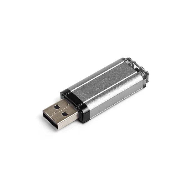 Cinza usb flash drive em um fundo branco . — Fotografia de Stock