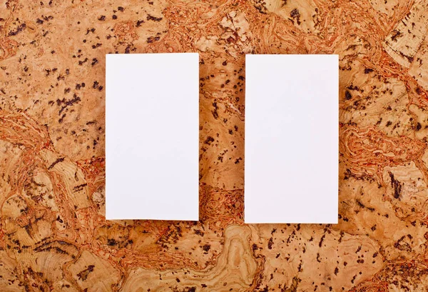 Mockup of white business cards at a cork background — Stock Photo, Image