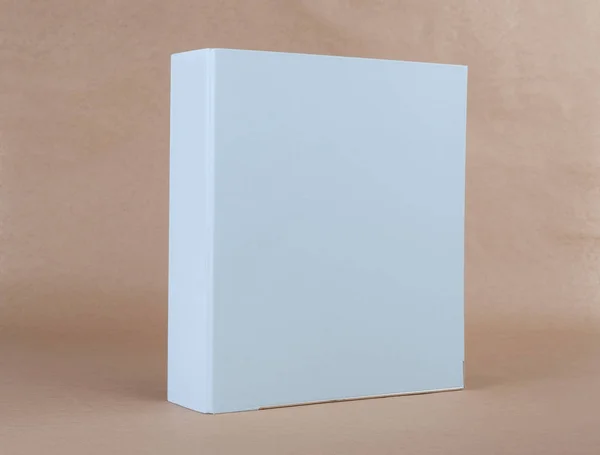 A blue ring binder on beige background. — Stock Photo, Image