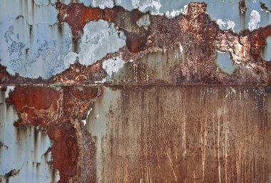 Metal bir arka plan. Metal yüzey paslı ve kalın.