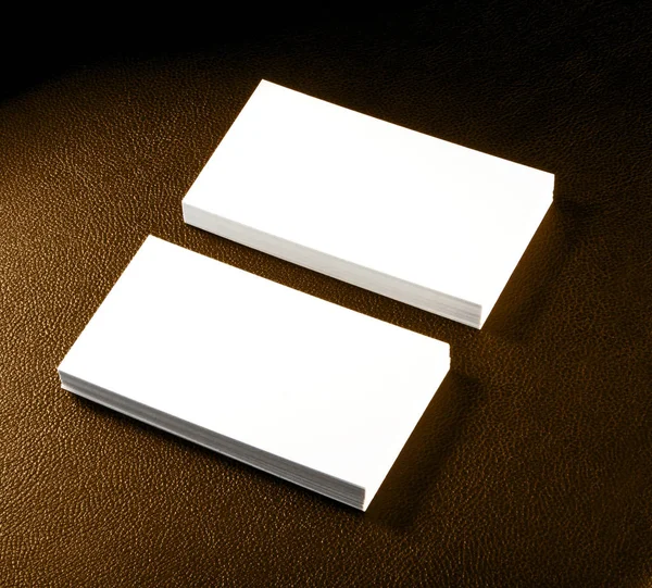 Mockup of two horizontal business cards at brown leather backgro — Stock Photo, Image