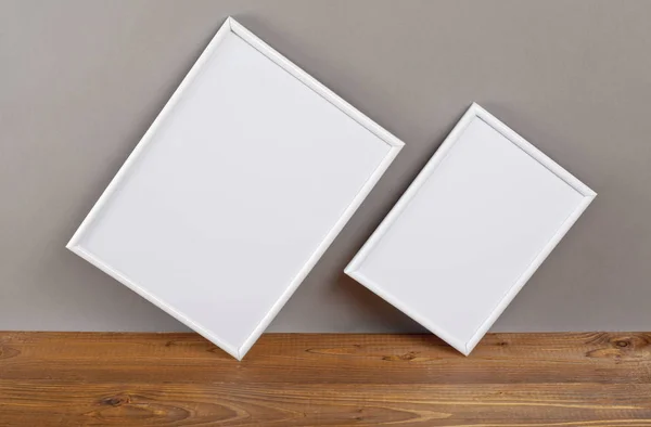 Two blank photo frames for painting or picture on gray backgroun — Stock Photo, Image