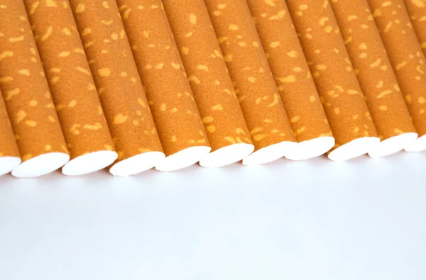 Long Row Cigarettes Orange Filter Tips — Stock Photo, Image