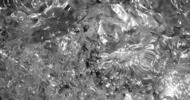 Mouvement bulles d'oxygène dans un liquide. Belle structure de l'eau en macro un fond naturel