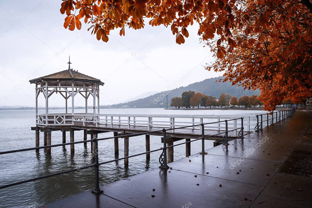 wooden pavilion at the pier, autumnal scenery lake constance, ge