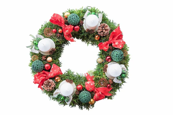 With ribbons, baubles and candles decorated evergreen yew wreath — Stock Photo, Image