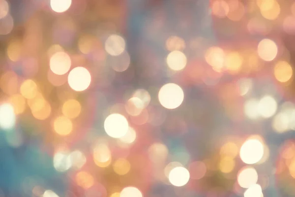 Blurry background of christmas lights - light pastel colors — Stock Photo, Image