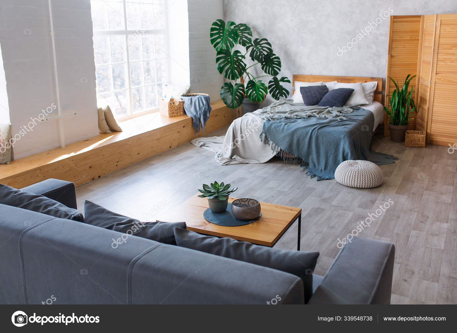 pics Modern Studio Flat Design modern studio apartment design with bedroom and living space hotel room with panoramic window king sized bed couch and coffee table city flat concept stock photo image by c sergiophoto 339548738