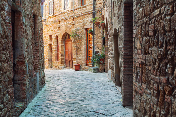Charming little tight narrow streets of Volterra town in Tuscany, Italy, Europe