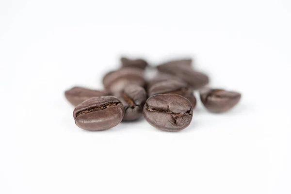 Closed up coffee beans on white — Stock Photo, Image