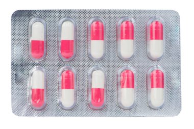 Pembe ve beyaz kapsül blister kutu içinde