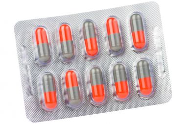 Turuncu ve gri kapsül blister kutu içinde