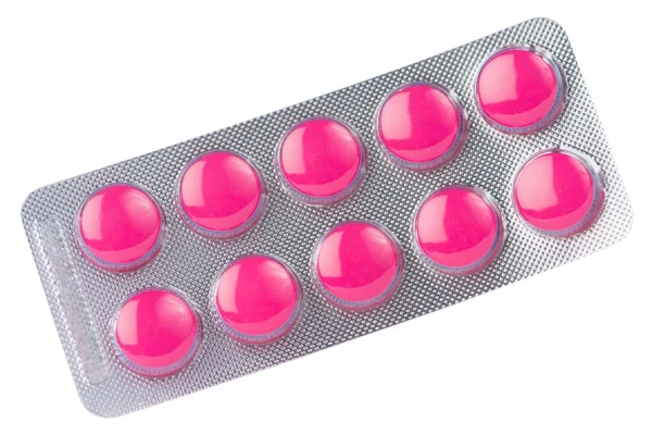 Rosa tablett i transparent blisterförpackning — Stockfoto
