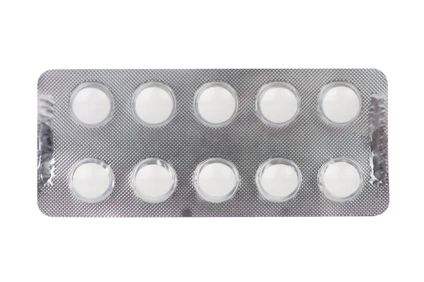 Vita medicinska tabletter i blisterförpackning — Stockfoto