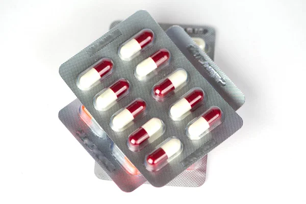 Capsule in blister pack on white — Stock Photo, Image