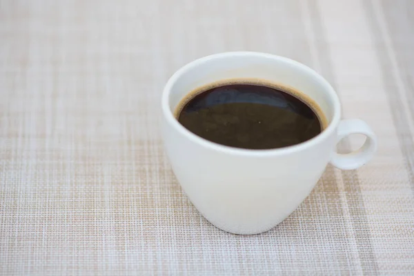 Black coffee in white cup — Stock Photo, Image