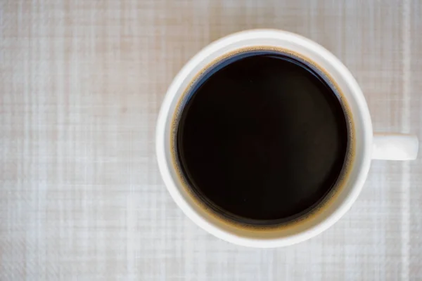 Black coffee in white cup — Stock Photo, Image