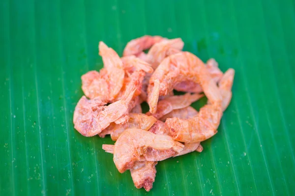 Dried shrimp on green banana leaf — Stock Photo, Image