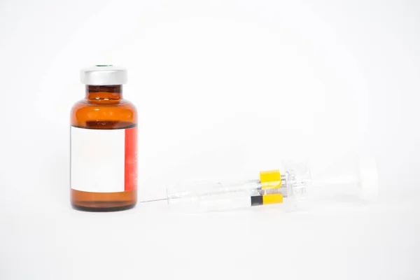 Brown Injection vials and syringe — Stock Photo, Image