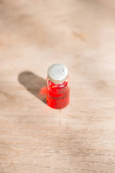 Injection vial show medical background — Stock Photo, Image