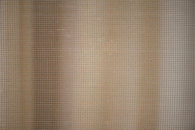 Kapalı sivrisinek teli ekranı dokuyu ve arkaplanı gösterir 