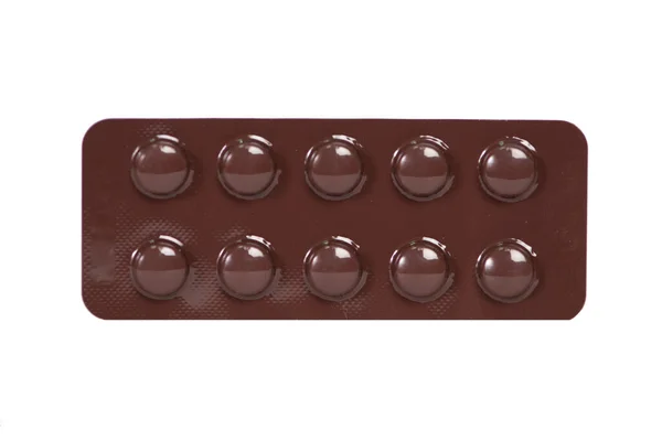 Kapalı Kahverengi Tablet Paketi Beyaz Üzerine — Stok fotoğraf