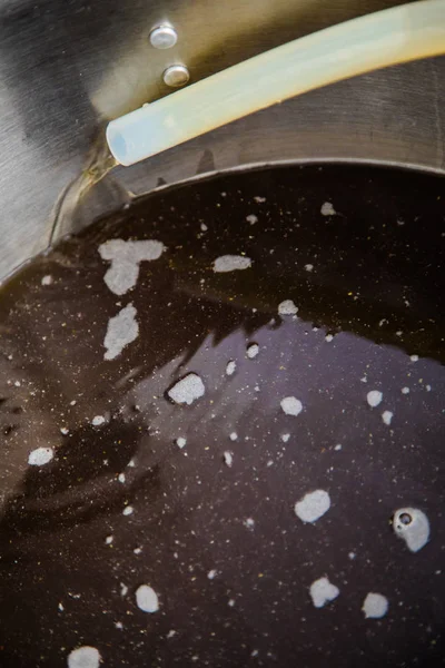 Pouring Brew Beer into the Boil Kettle — Stock Photo, Image