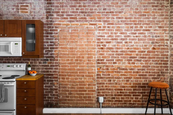 Industrial Brick Wall Perspective in a kitchen — Stock Photo, Image