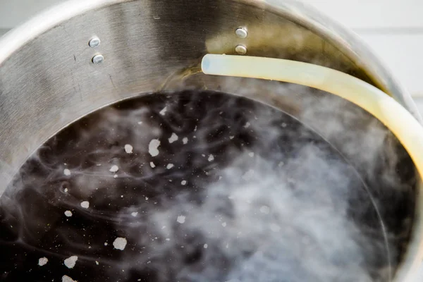 Pouring Brew Beer into the Boil Kettle — Stock Photo, Image