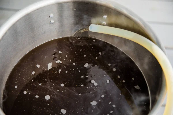 Pouring Brew Beer into the Boil Kettle — Stock Photo, Image