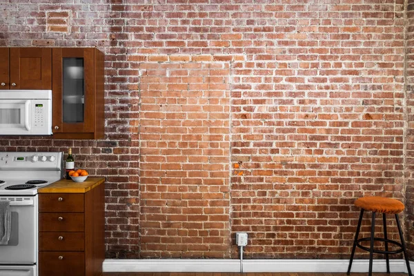 Perspectiva de la pared de ladrillo industrial en una cocina — Foto de Stock