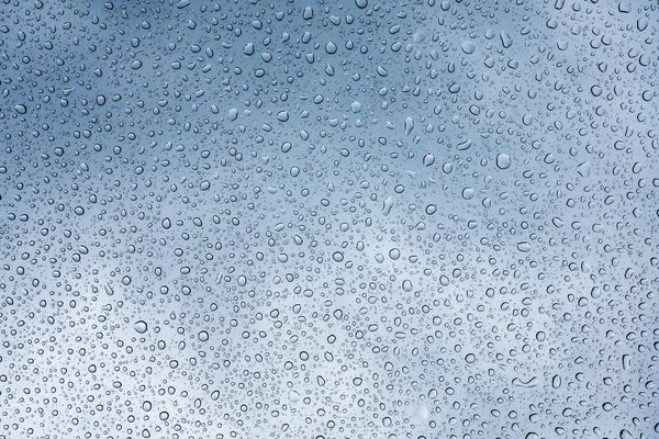 Gotas de lluvia abstractas sobre vidrio Textura —  Fotos de Stock