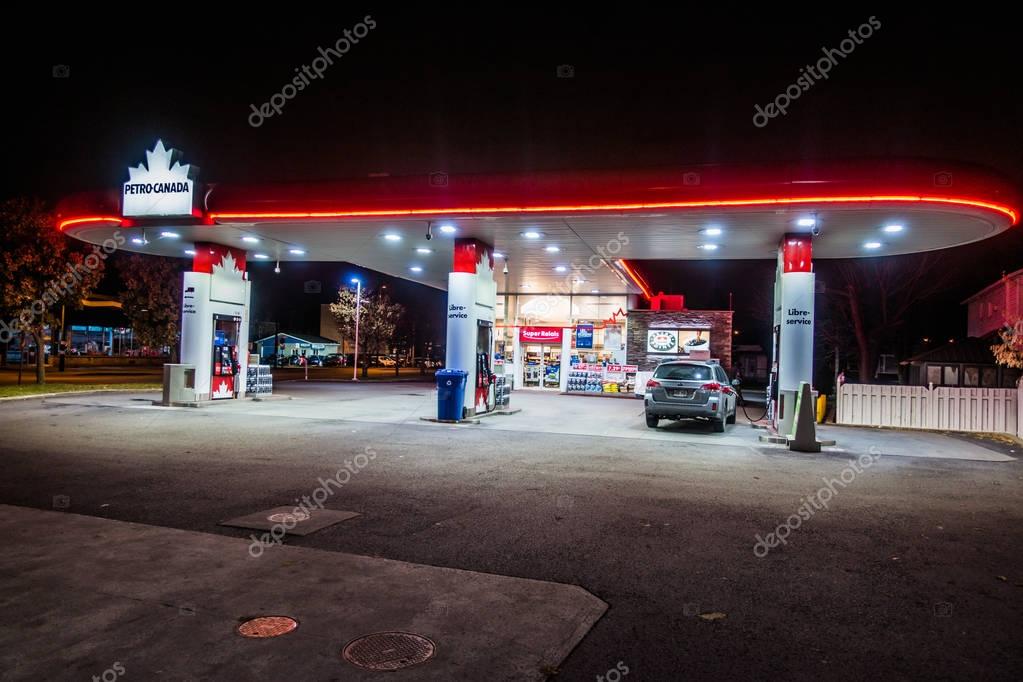 Montreal, Canada - December 1, 2017: Petro Canada Commerce and Gas Station Illuminated Late at Night