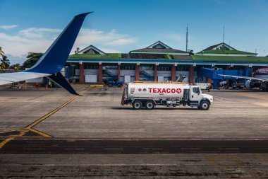 SAN ANDRES ISLAND, Colombia - Circa March 2017: Texaco Fuel Tanker on the Airport Track of San Andres, Colombia clipart