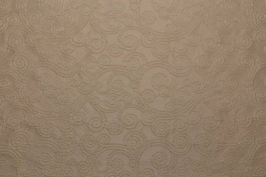 Simetrik desenli ve tekstil desenli beyaz kumaşın genel görünümü
