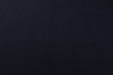 Tekstil dokusu arkaplanı olan güzel siyah kumaşa yakın çekim