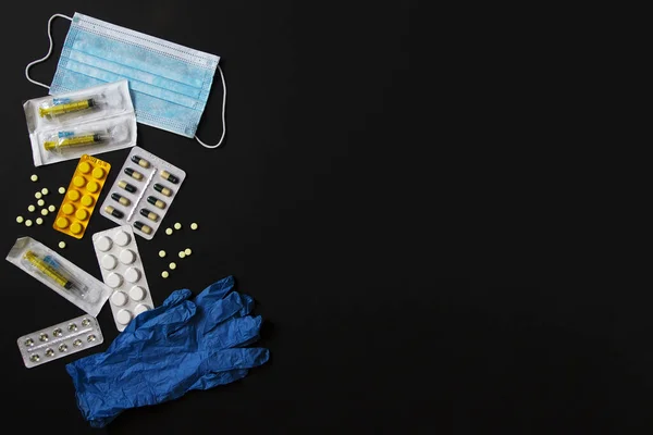 Medical Mask Gloves Syringe Pills Black Background Top View Flat — Stock Photo, Image