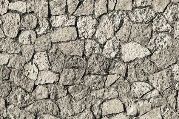 Mosaic texture stone wall of beige color — Stock Photo, Image