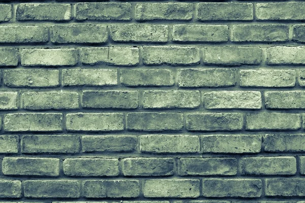 Textuur van een oppervlakte groene kleur baksteen — Stockfoto
