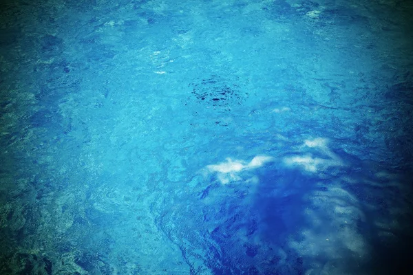 Whirlpool abstracte textuur en blauwe achtergrond — Stockfoto