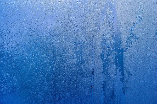 Textura abstracta gotas de agua congeladas de color azul — Foto de Stock