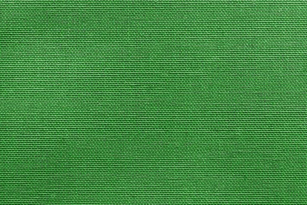 Strukturert grovt bakgrunnsstoff av grønn farge – stockfoto