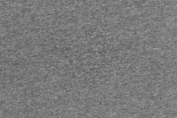 Texturierter Hintergrund aus Strickstoff graue Farbe — Stockfoto