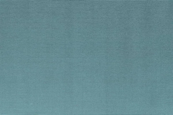 corrugated textured background of fabric turquoise color