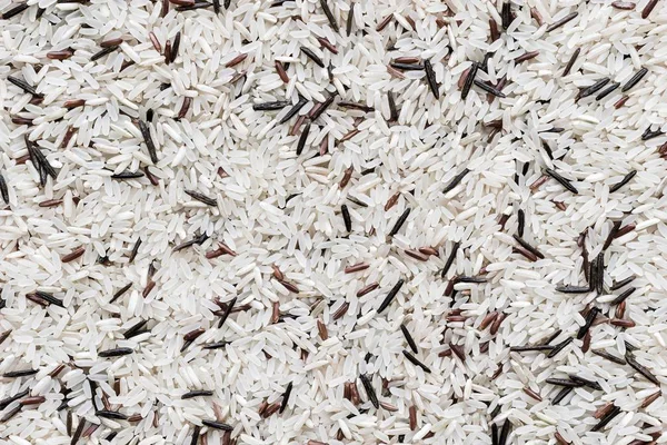 Fondo y textura de semillas secas de arroz — Foto de Stock