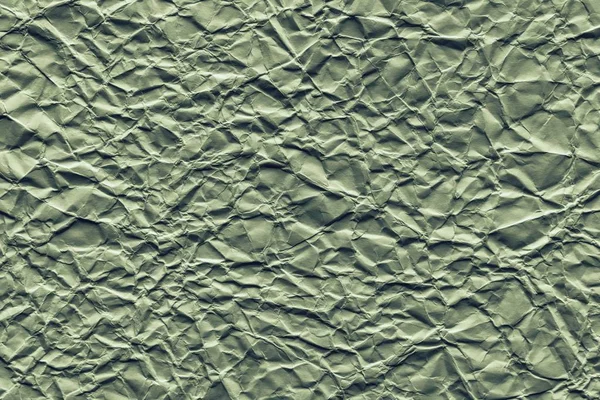 Crumpled sheet paper of green color — Stock Photo, Image