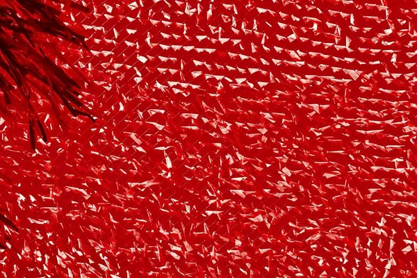 Abstrakte Hintergrundtextur eines Gitters und eines Gewebes von roter Farbe — Stockfoto