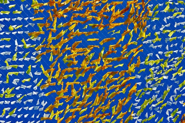 Abstracte achtergrond textuur van een raster en weefsel van blauwe en gele kleur — Stockfoto
